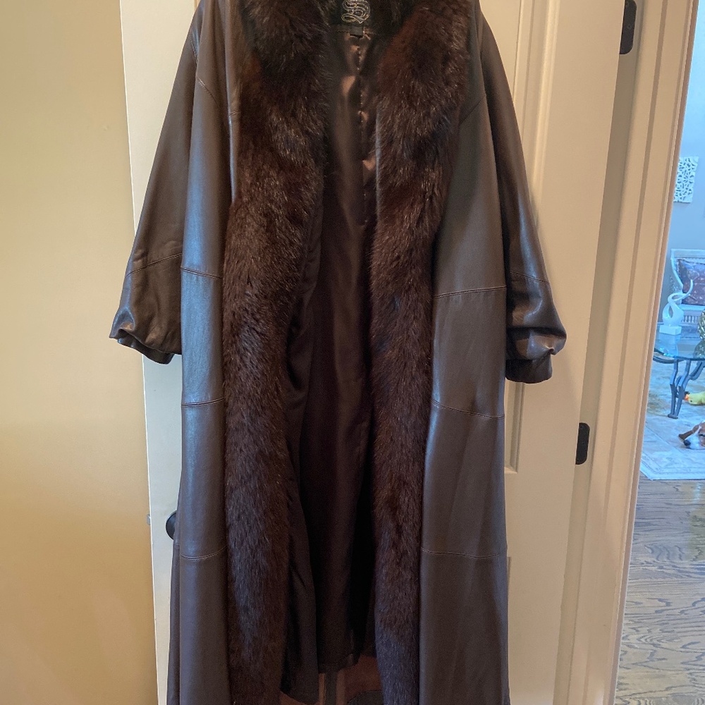 Full length leather coat with real fox trim.